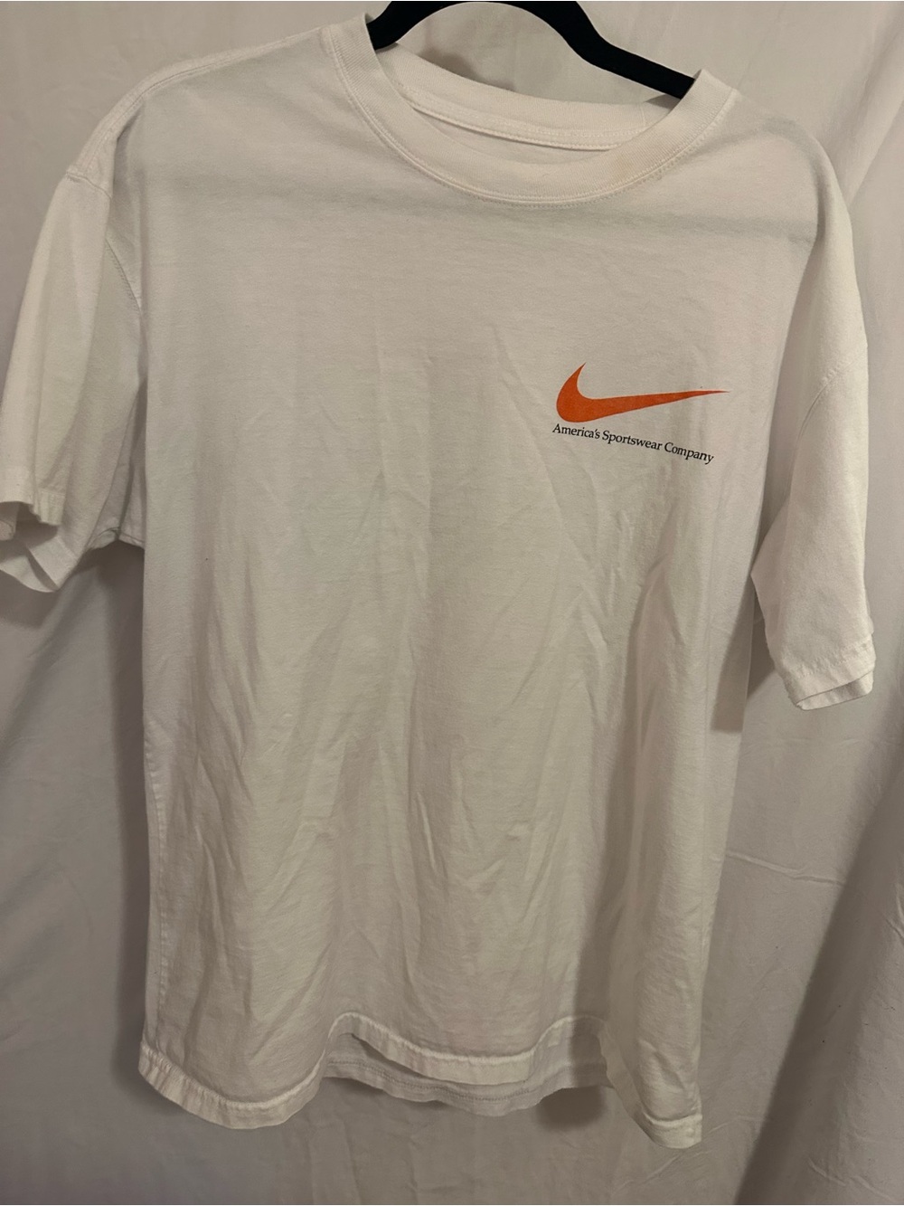 Nike White Short Sleeve T-Shirt with Orange Swoosh